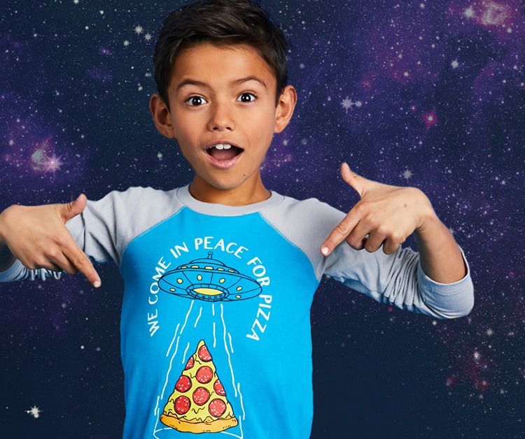 Photo of a boy in outer space wearing a cool graphic tee